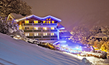 Hotel by night in winter.