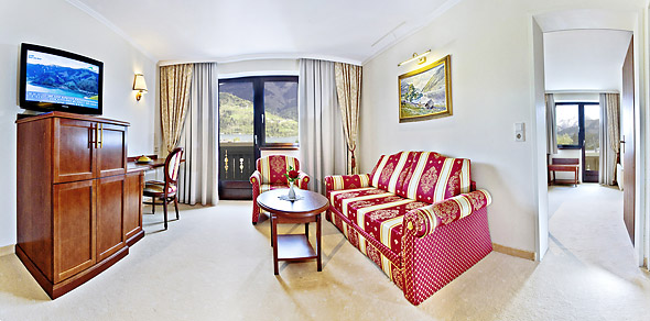 Suite with two balconies to the lake and village at the Hotel Berner in Zell am See.
