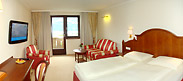 Junior Suite with balcony with view over Zell am See and the lake, Hotel Berner.